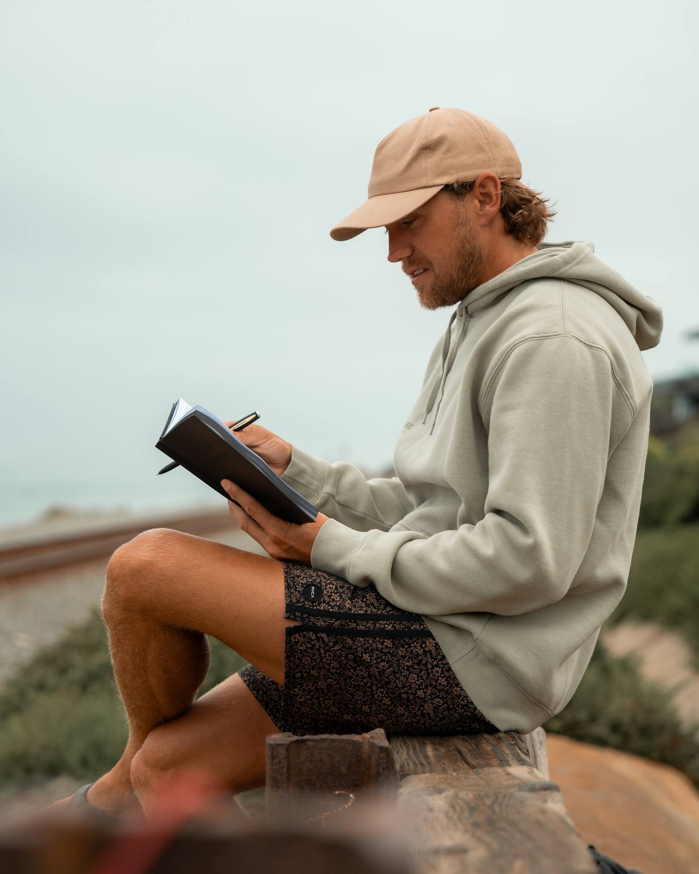 A quiet moment with The Epic Journal by the ocean